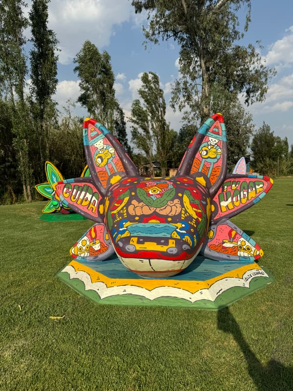The same lettered sculpture seen from the side