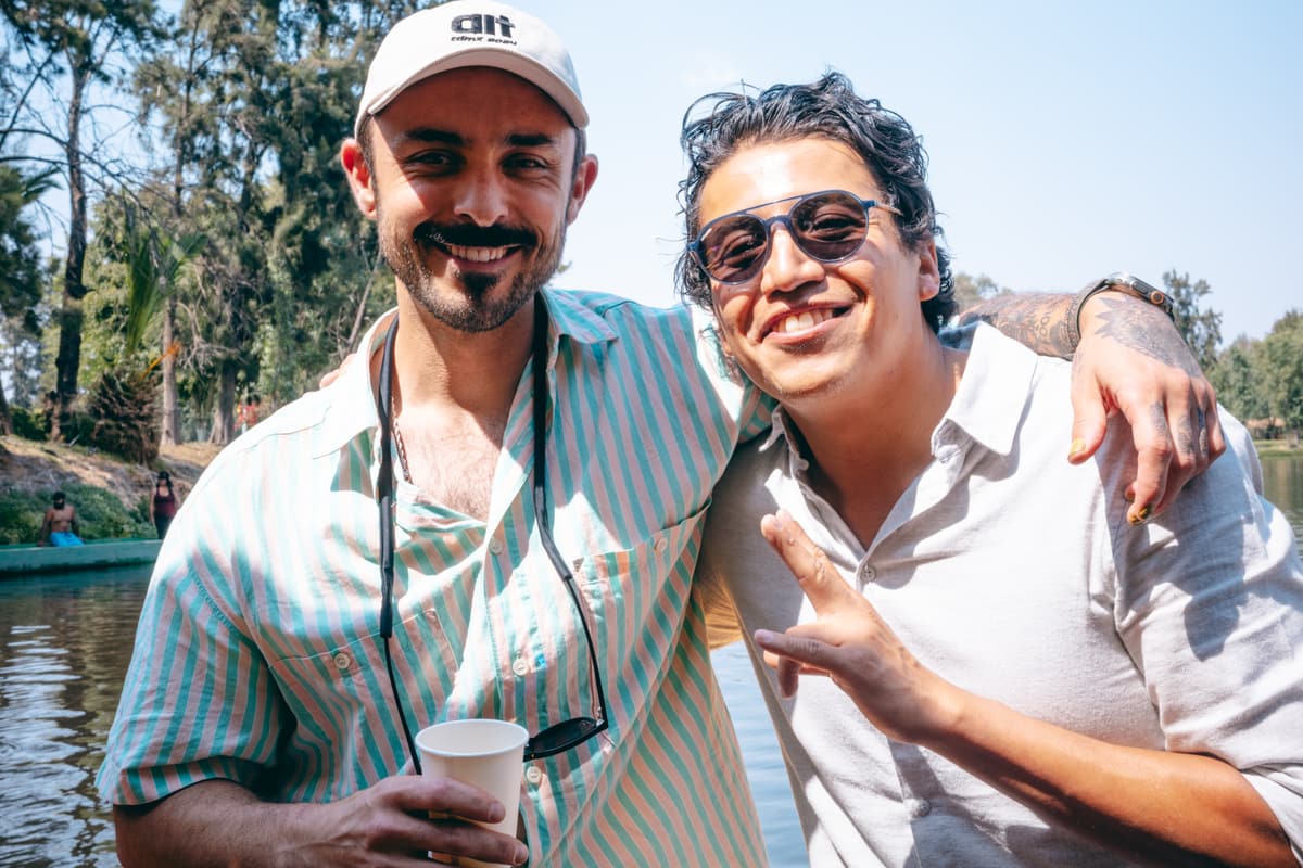 Two attendees posing together on the canal