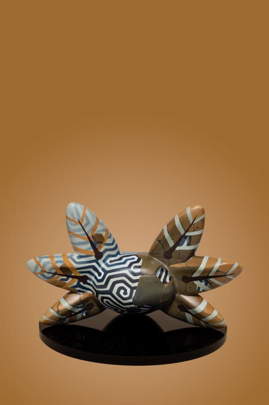 Axolotl sculpture painted by Alejandro Nahual, back view