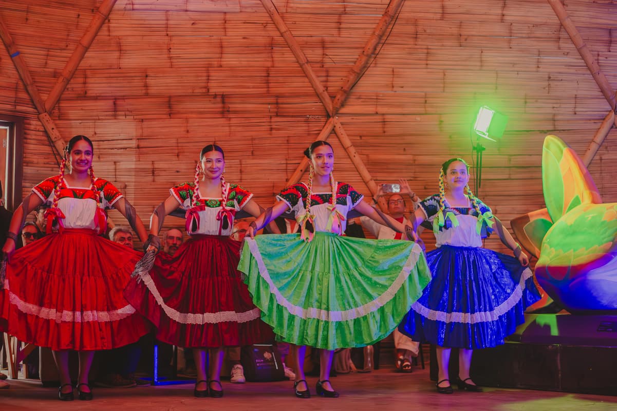 Folklorico dancers in red, green and blue dresses