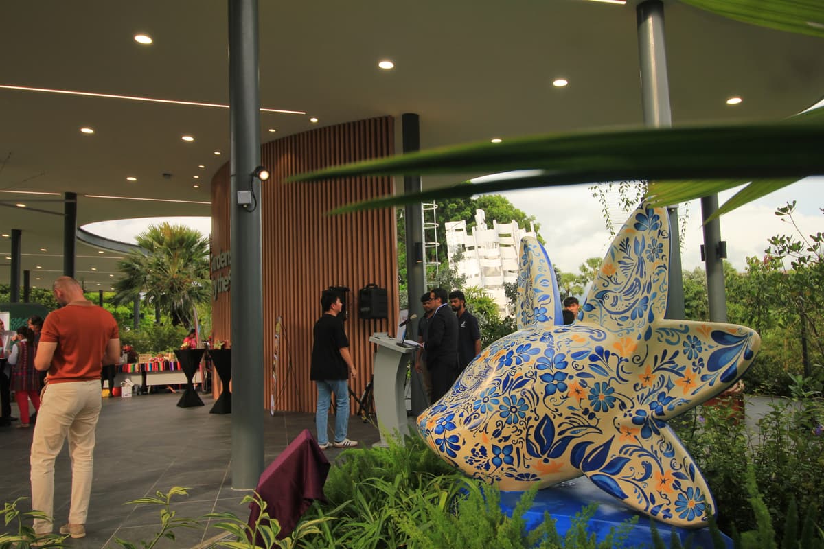 Guests arriving at the pavilion where the sculpture stands