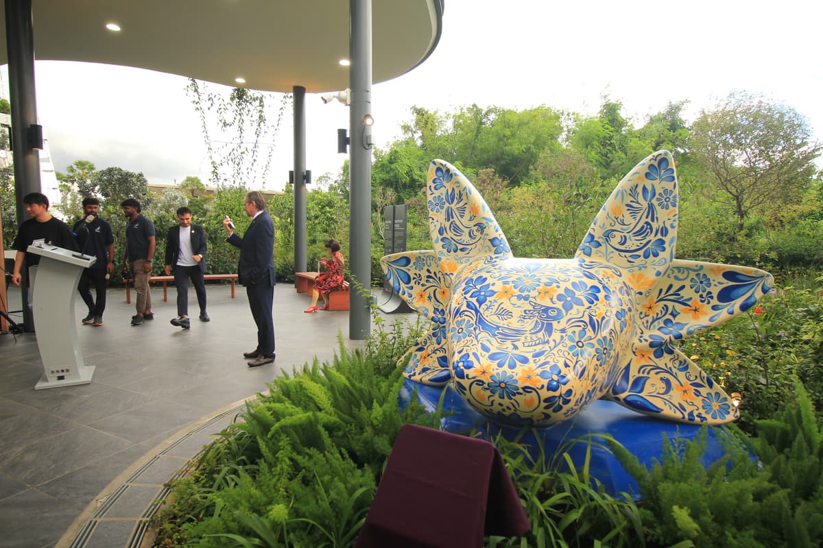 Opening remarks delivered beside the sculpture