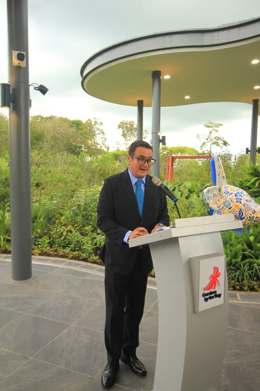 A speaker addressing the guests