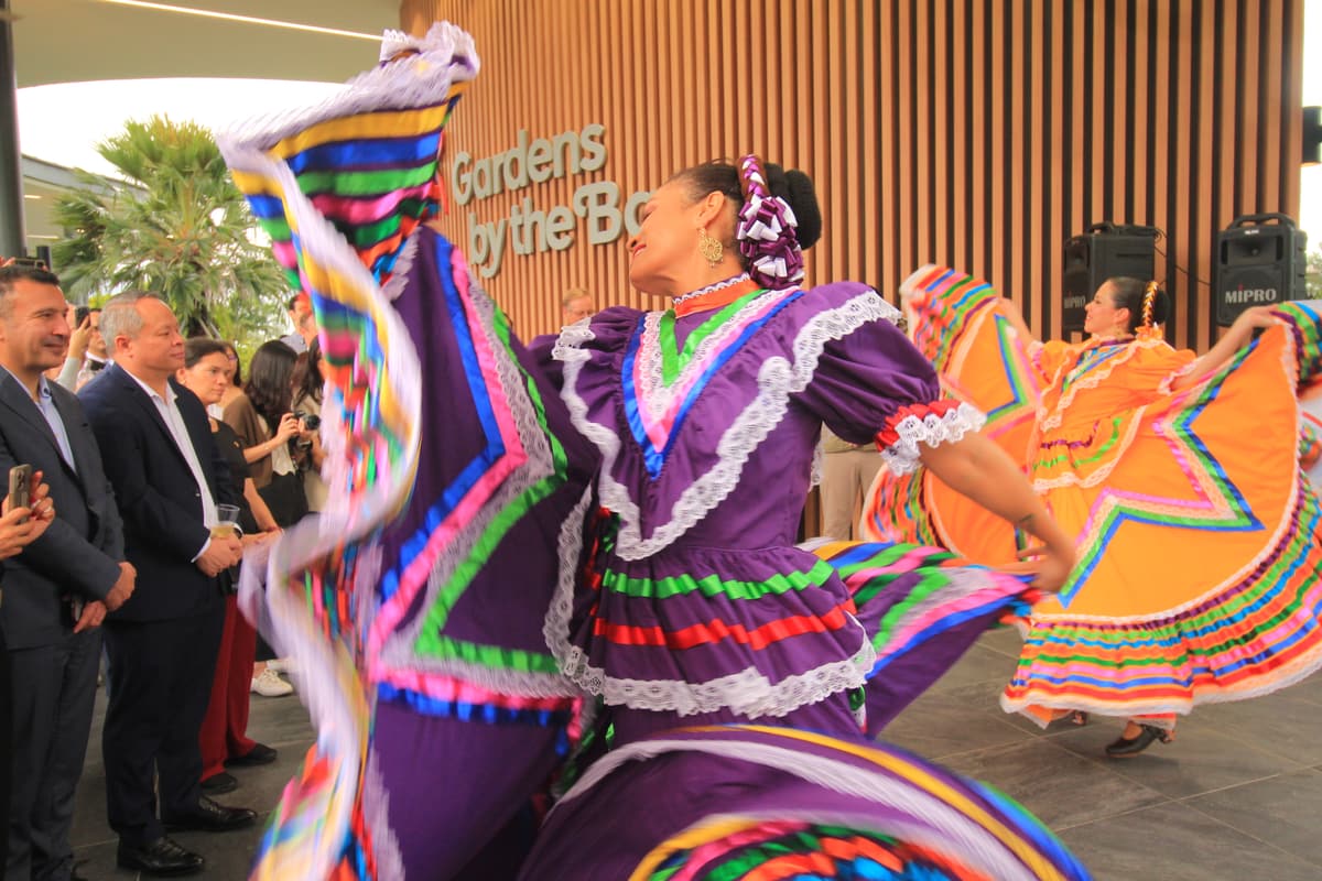 Dancers with their skirts held high