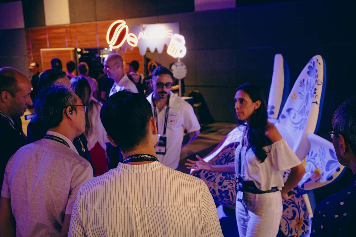The crowd mingling through the exhibition