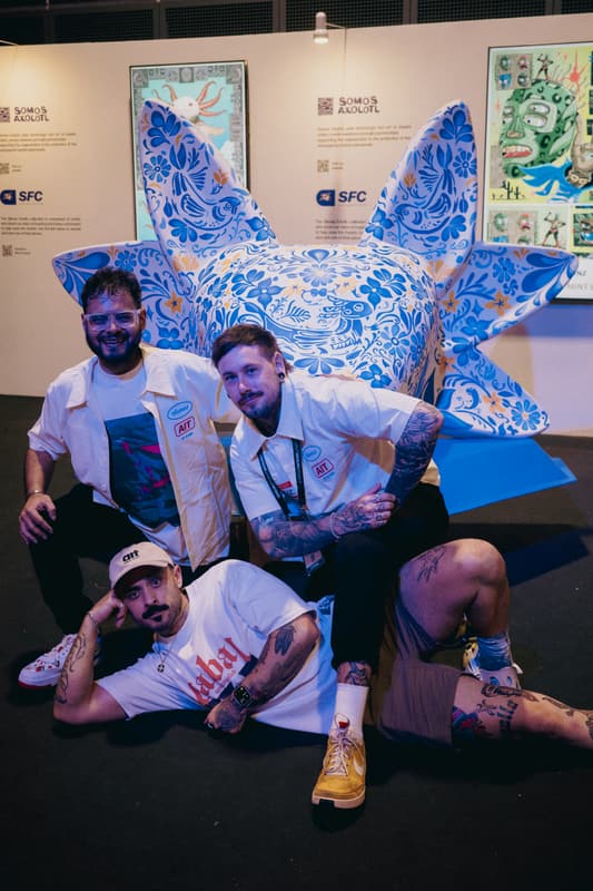 The team with the sculpture at the close of the show